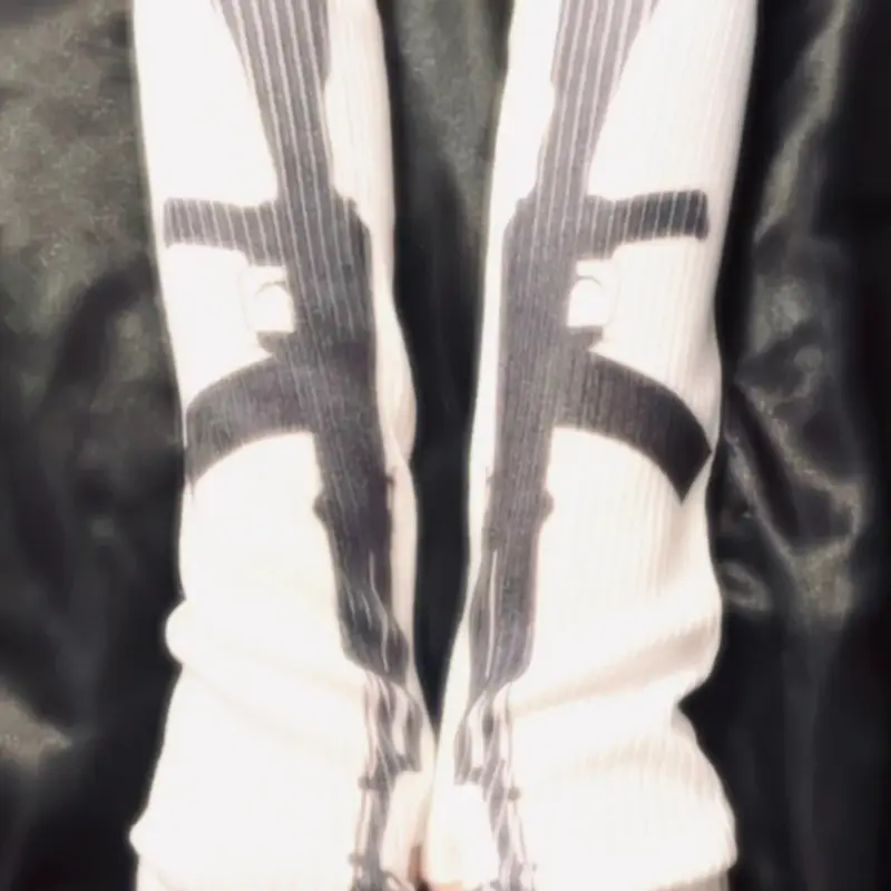 These Sweet & Savage long knit gloves feature an edgy gun print for a unique street style. Perfect for a steampunk inspired look or adding a rebellious touch Seamless knit gloves Gloves for winter
