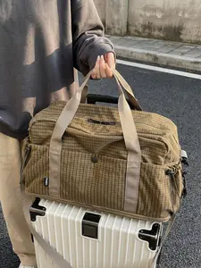 Fashionable and practical functional casual plaid handbag, simple retro style personalized large capacity single shoulder crossbody bag, multi pocket design, suitable for daily commuting and short distance travel Travel Duffel Bag