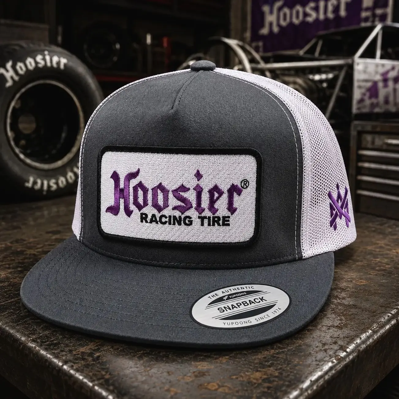 [BEST SELLER 2026] Hoosier Racing Tire Trucker Hat, Gray and White Mesh Snapback Cap, Vintage Racing Style Hat, Embroidered Hoosier Logo Patch, Motorsport Garage Workwear Headwear, Classic Flat Bill Cap for Racing Fans and Car Enthusiasts