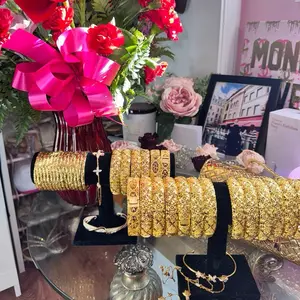 Gold Bangles - Elegant Design with Decorative Elements, Perfect for Any Occasion