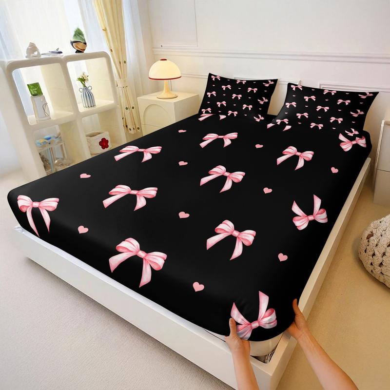 3-piece Bedding Set Features A Black Background With Pink Bow And Heart Prints, Including A Fitted Sheet And Two Unfilled Pillowcases. The Design Blends Two Elements, Creating A Romantic And Sweet Yet Cool Bedroom Décor, Gift Choice, Bed Sheet Sets