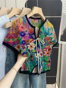 Women's khaki bohemian vacation short-sleeve knit top. Loose round neck, contrast floral print, front tie and contrast piping. Comfortable for spring & summer casual wear.