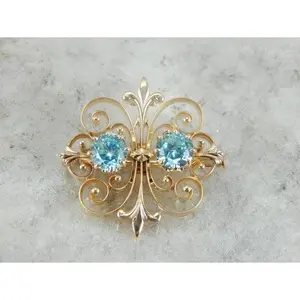 Scrolling Antique Blue Zircon Pendant