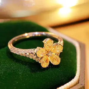 yellow A luxurious hand polished Moissanite ring paired with yellow zircon. Exquisite craftsmanship.Sparkling Moissanite and yellow zircon. Master level aesthetic design. Excellent quality. Brilliant and radiant. High quality hand polished.