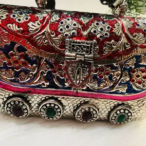 Metal with stone work luxury bag