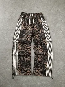 Unisex style, streetwear-inspired fashion striped and leopard-print Bold Patterns drawstring waistband joggers. A versatile summer fashion item that pairs well with various outfits. Stylish, trendy, hip-hop, sports, and hip-hop dance.