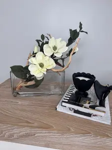 MAGNOLIA WITH BRANCH IN RECTANGULAR VASE