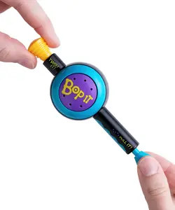 World's Smallest Bop It! 25th Anniversary Edition - 90s Style Skill Game with Commemorative Stand for Display