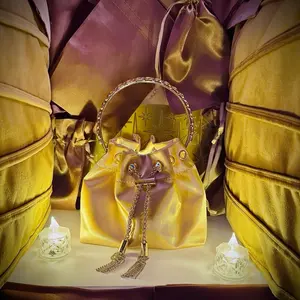 GIZA-Gold Satin Bucket Bag with Gold Chain Handle and Tassel Detailing