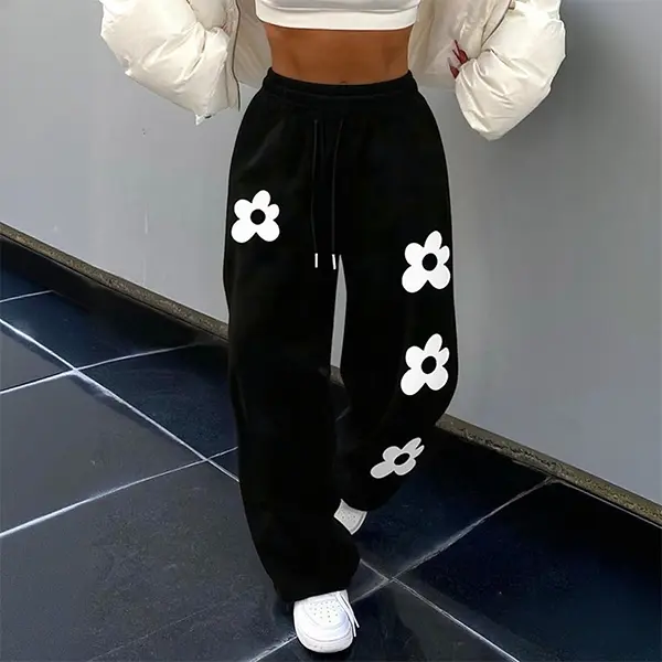 Women’s soft, loose wide-leg casual sweatpants with cute floral print and elastic drawstring; breathable lounge pants suitable for workouts, travel, and everyday wear.