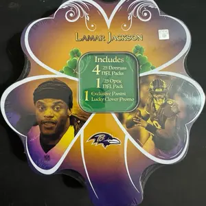 Lamar Jackson Limited Edition Panini NFL Shamrock Tin with 4 2025 Donruss Packs and 1 2025 Optic Pack! That’s 5 chances to pull a DOWNTOWN or UPTOWN