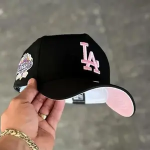 New Era Los Angeles Dodgers 9FORTY Cap - Trendy Streetwear Style, Adjustable Fit for All Sizes. Premium Embroidered Hat for Baseball Fans.