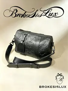 Pre-owned Louis Vuitton Keepall XS in Black Monogram Embossed Leather, Matte Black Hardware, Adjustable Strap