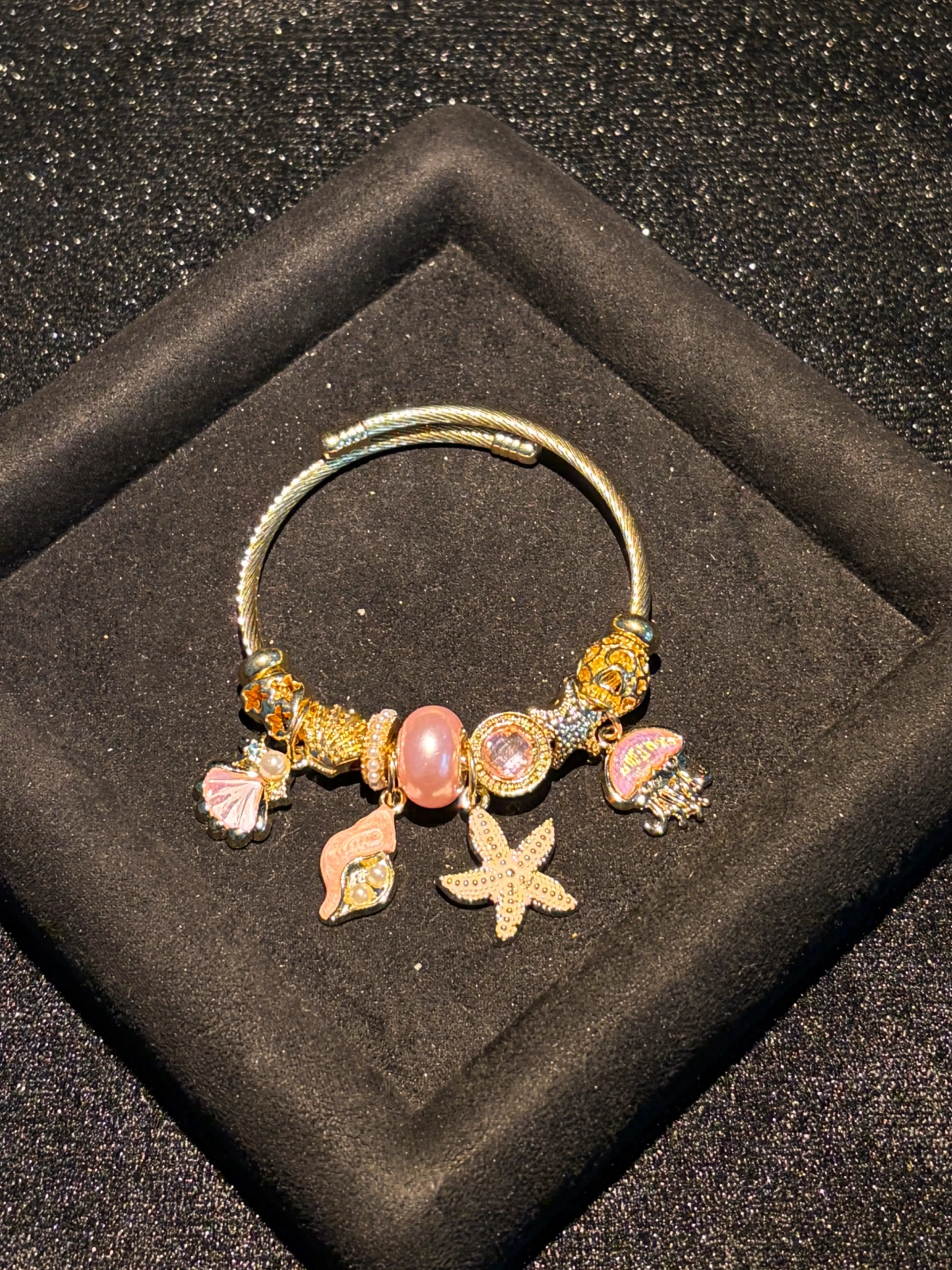 Ocean Charm Open Bangle for Women, Gold Tone Twisted Cable Cuff Bracelet with Jellyfish, Starfish, Shell & Conch Pendants, Pink Bead Charms Summer Beach Jewelry Gift