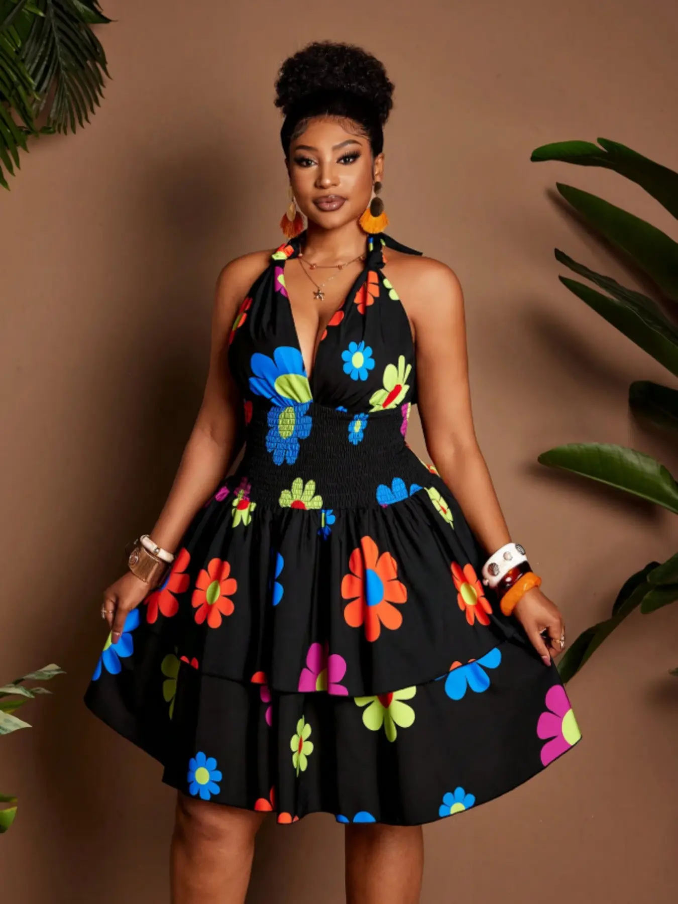 A plus-size women's halter-neck dress with a sweet floral print—elegant and stylish. Summer dress with a ruffled hem. Women's summer clothing. Casual Womenswear