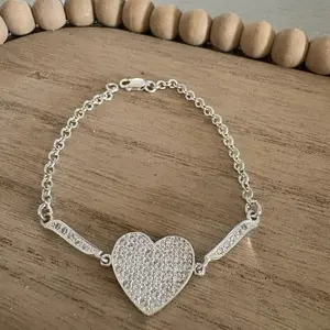 Silver .925 Heart Bracelet 7 1/2 Inch Long with Pave Diamond Accents for Women