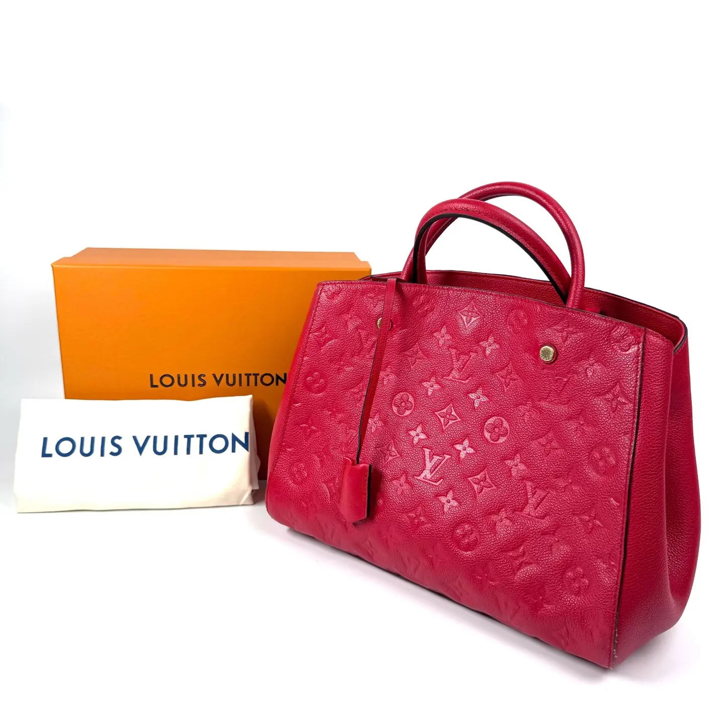 Pre-owned Louis Vuitton Montaigne, Bright Red Embossed Grained Calfskin Montaigne Handbag, 2014, Approx. 29cm Base Length, Serial No. N23179591