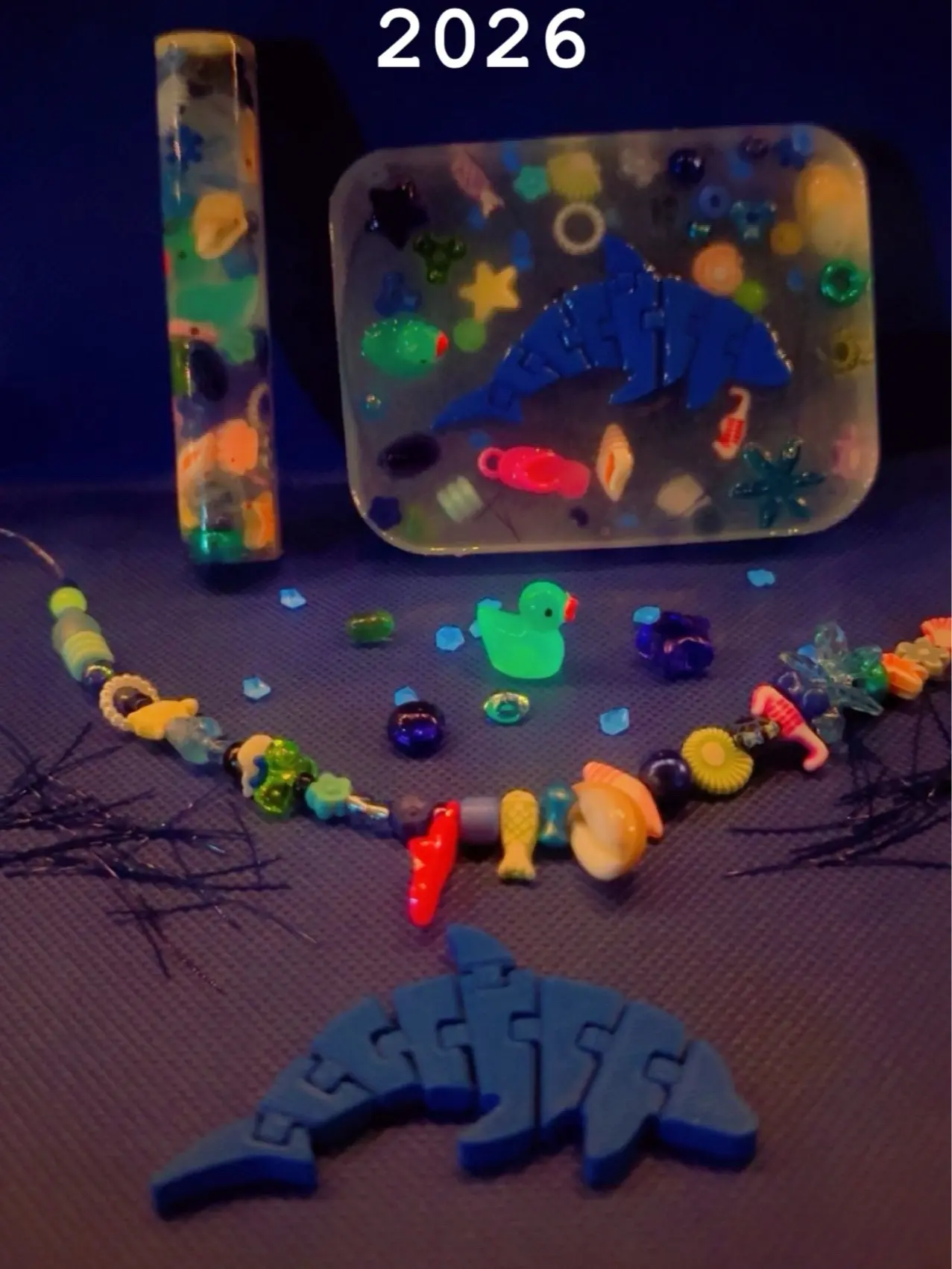NEW 2026 Beach-themed Edition combo pack! Pick & Pull pad (with ARTICULATED DOLPHIN) PLUS a beach-themed picky stick! ALSO - they have some GLOW IN THE DARK items / embeds!