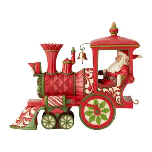 On Track for Good Things ENESCO LLC AR ITASCA Santa's got all manner of merriment in tow. 6 in H x 3 in W x 7 in L 1.1 lbs.