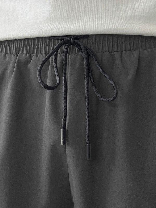 Men's Loose Fit Gray Sweatpants with Side Stripes Gold Accents Comfortable Design Sports Casual Style Bottoms for Gym Wear - High Waisted Athletic