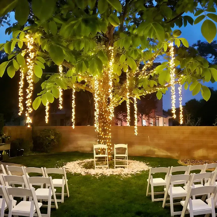 Ollny 740 LED Warm White Cluster Lights, 9-in-1 Modes IP44 Outdoor String Lights with Plug Green Cable for Party Wedding Outdoor Decorations