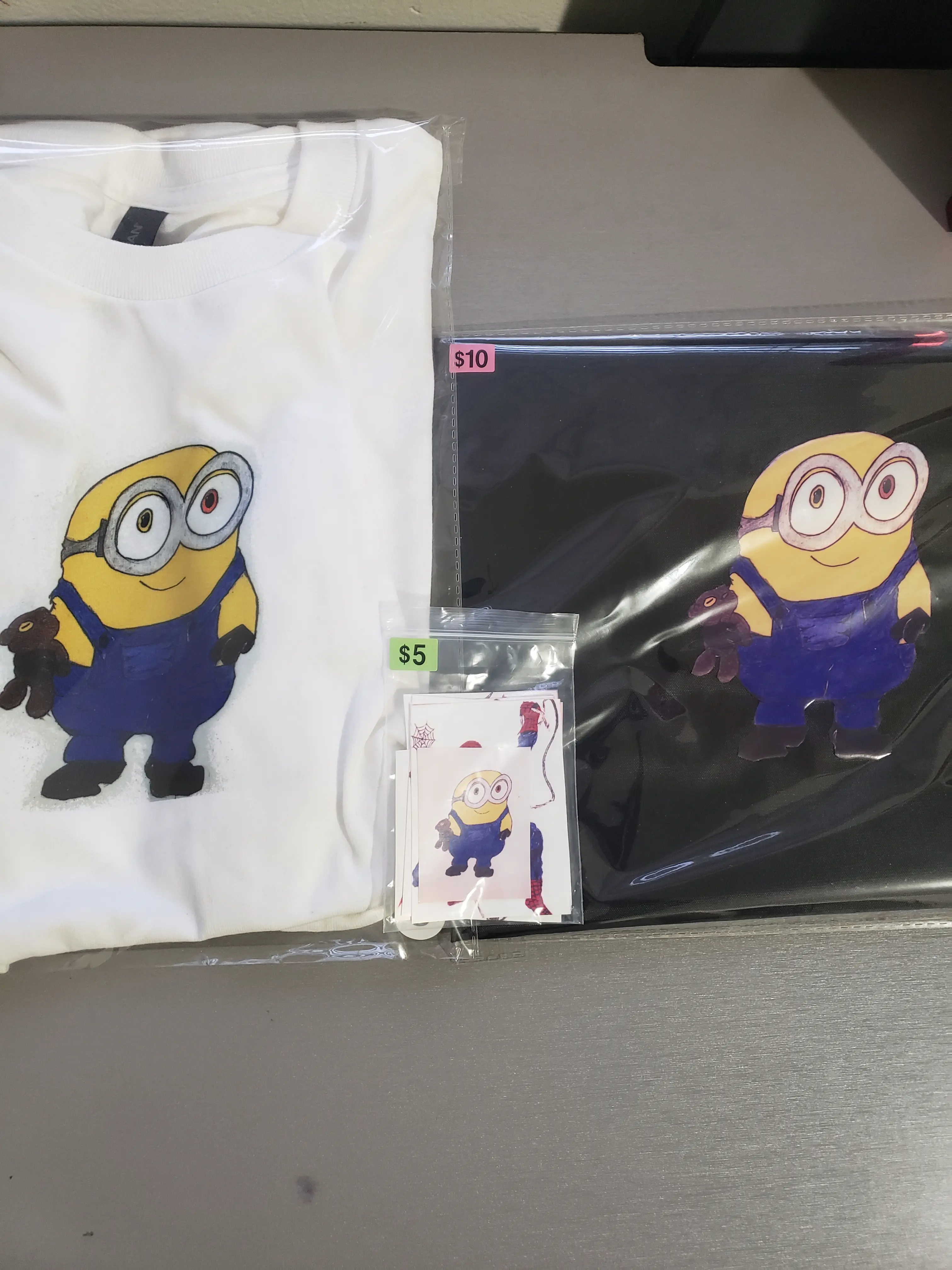 Minion Graphic Design T-Shirt, Bookbag and Stickers