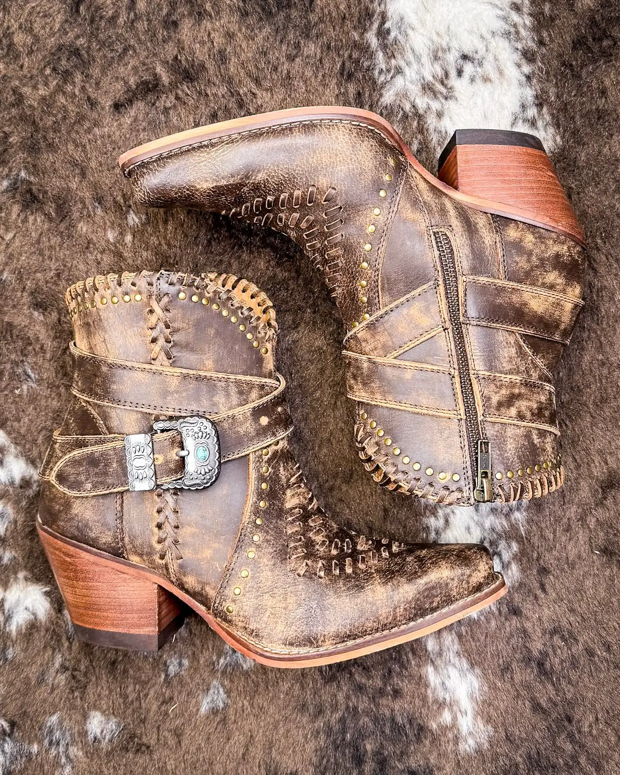 Haley's High Peak Booties by Myra Bag