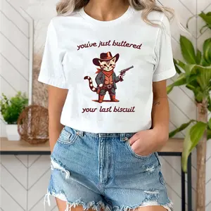 Cowboy Cat With Gun, You're Just Buttered Your Last Biscuit Shirt Whisker In The Wind Sweatshirt, Hoodie, T Shirt Western Cat Tee