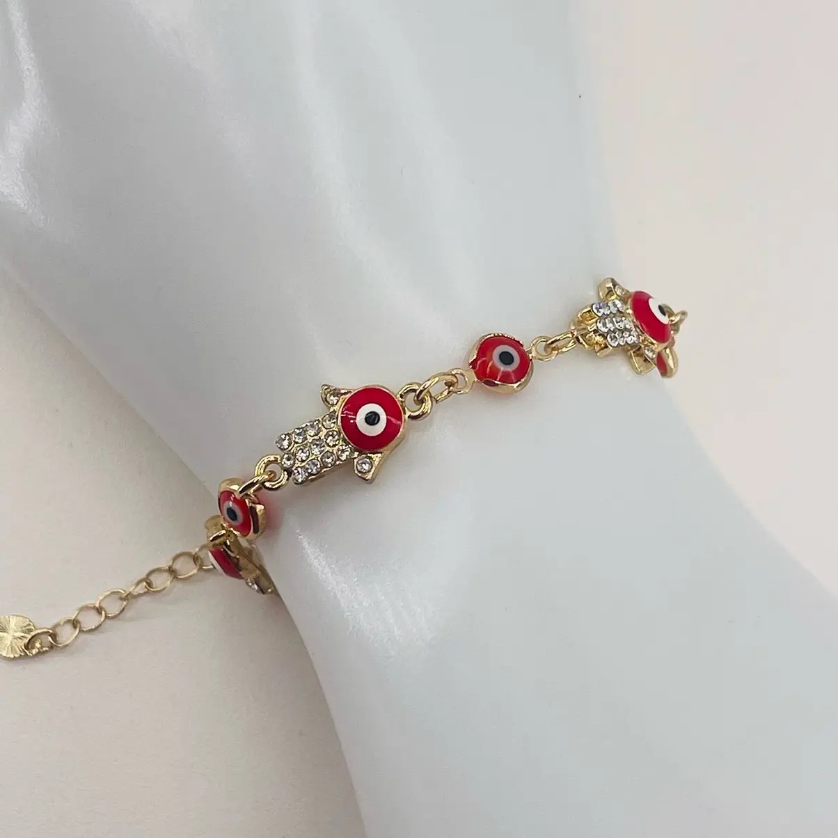 Pulsera ojo turco y mano hamza oro laminado 14k/Evil eye and hamza hand bracelet, 14k gold plated
