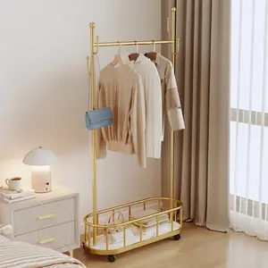 Clothing Rack With Wheels And Shelves For Clothes Storage, Sturdy Metal Golden Closet Rack For Living Room, Clothes Hanger Rack For Pants, Dresses, Living Room Balcony (31.4 Inch Width)