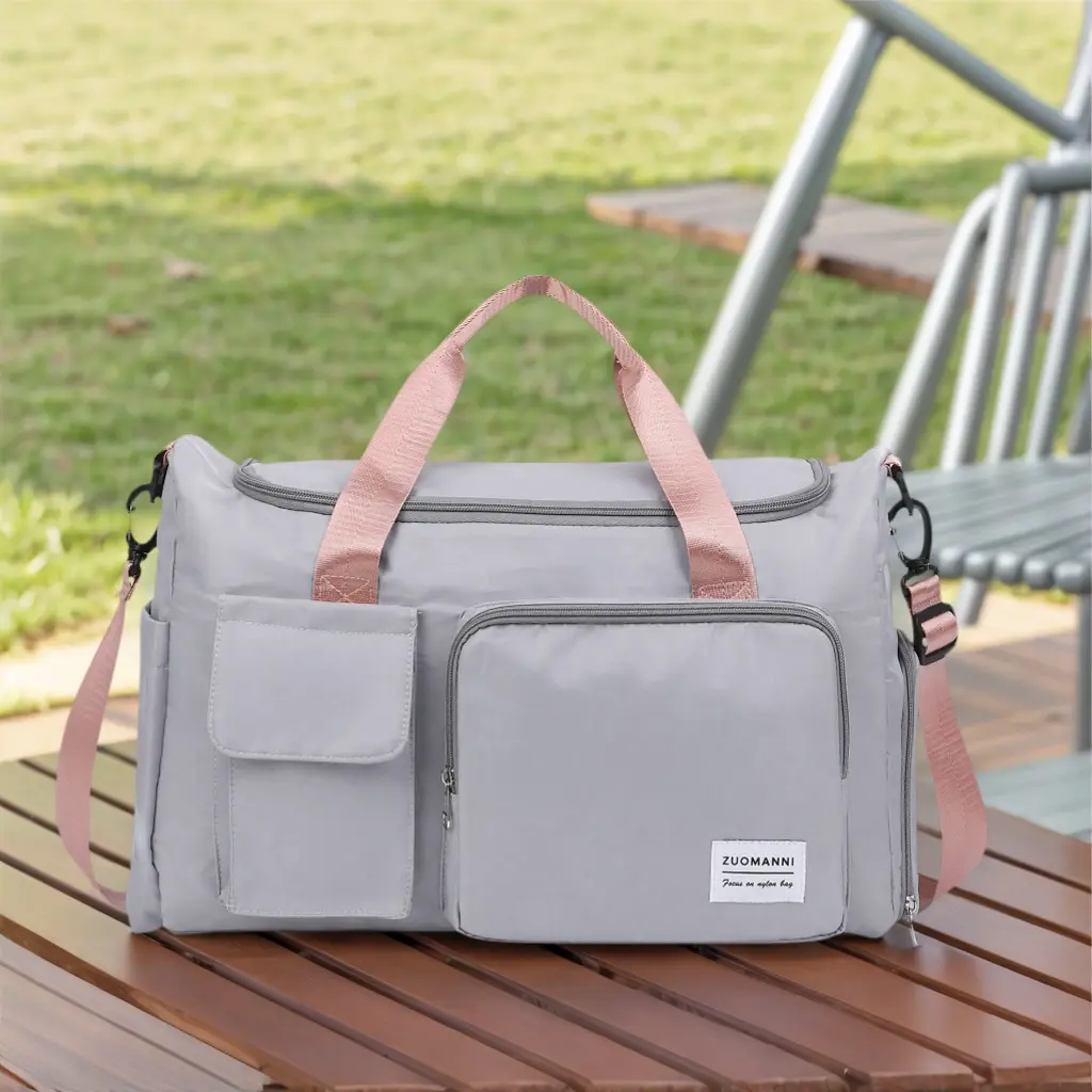 Spacious Portable Duffel Bag for Women, Large Capacity Travel Tote with Multiple Pockets, Durable Gym and Beach Carryall Featuring Water-Resistant Fabric, Perfect for Daily Commute and Weekend Trips