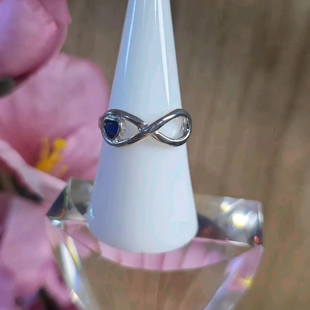 Anillo plata Italiana 925 con corazón zirconia azul diseño infinito con rodium