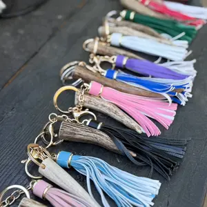 Rustic, Antler tassel keychain made with real antler and faux leather tassel.