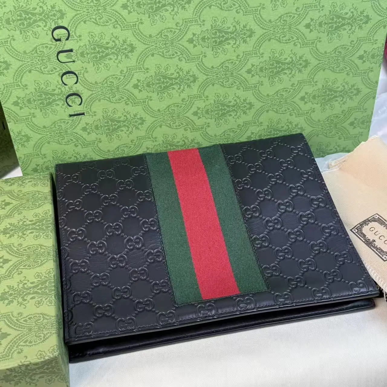 Pre-owned GUCCI GG Embossed Leather Web Stripe Zip Clutch Pouch