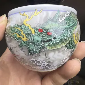 Master Crafted Teacup with Green Dragon Pattern for the Owner