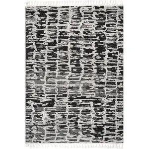 Cosette Abstract High Low Textured Tassel Area Rug