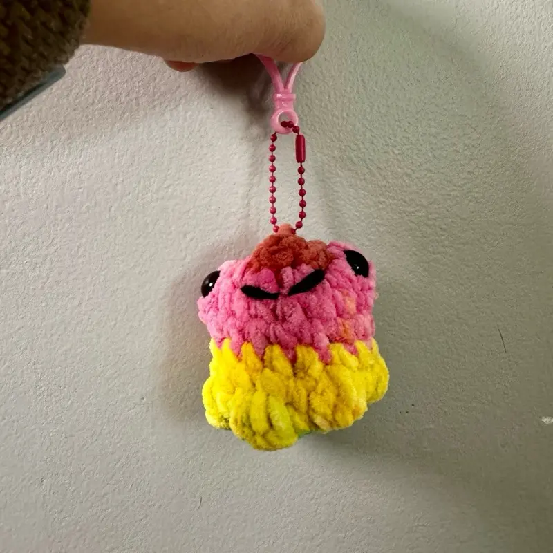 Handmade crochet pocket frog keychain