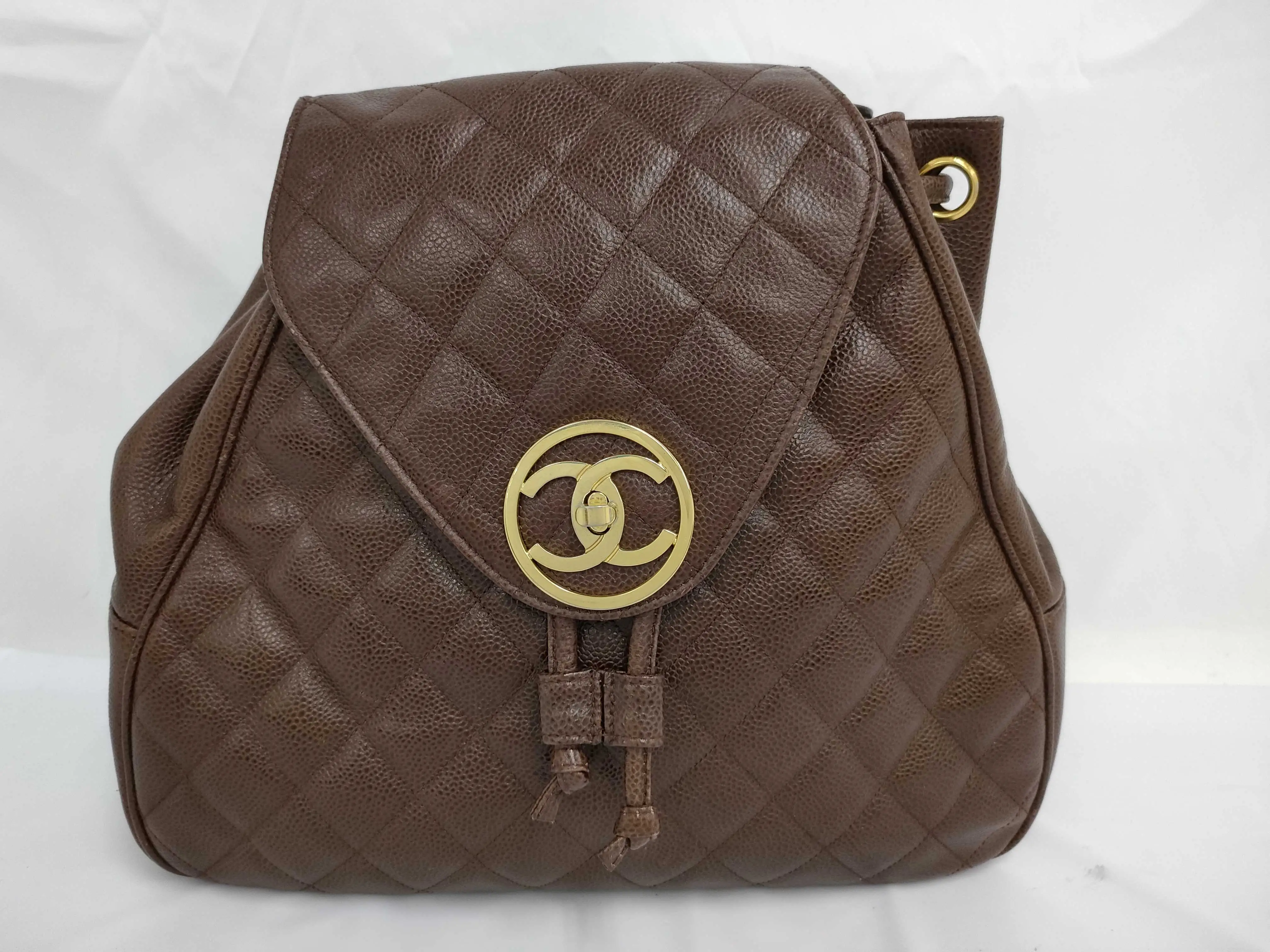Pre-owned CHANEL PVC Shoulder Bags Caviar Skin Matlasse Circle Coco Coco Mark Rucksack / Backpack GD Metal Fittings Brown Rucksack