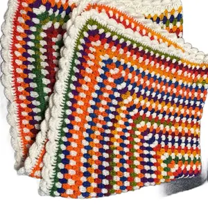 Granny square blanket with ruffled edge