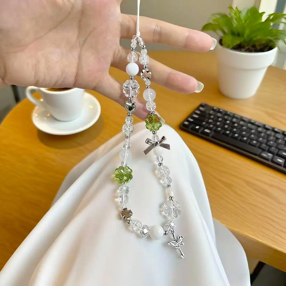 Hanging ornament pendant Four leaf clover ins hanging rope bead mobile phone wrist mobile phone chain DIY camera CCD chain Cell Phone Charm Phone Accessories