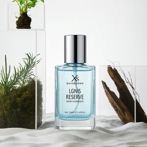 SHINESONN Ignis Reserve Ebony Agarwood Men's Perfume. Top notes are whiskey and cardamom; middle notes are cinnamon and agarwood; base notes are sandalwood, vetiver and amber. 50mL (1.69 fl. oz). Unique woody fragrance, showing your perfect temperament