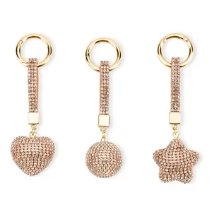 Shop LC Champagne Glass and Crystal 3-piece Set Heart  Ball and Star Keychain in Goldtone