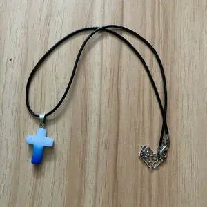 White and blue acrylic cross necklace