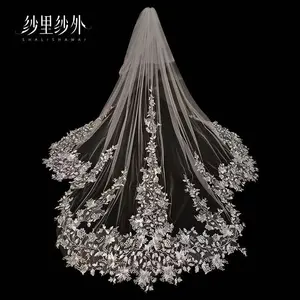 Bridal veil with lace trim and long train, new style headpiece for a fairy-like forest wedding with an ultra-fairy long train