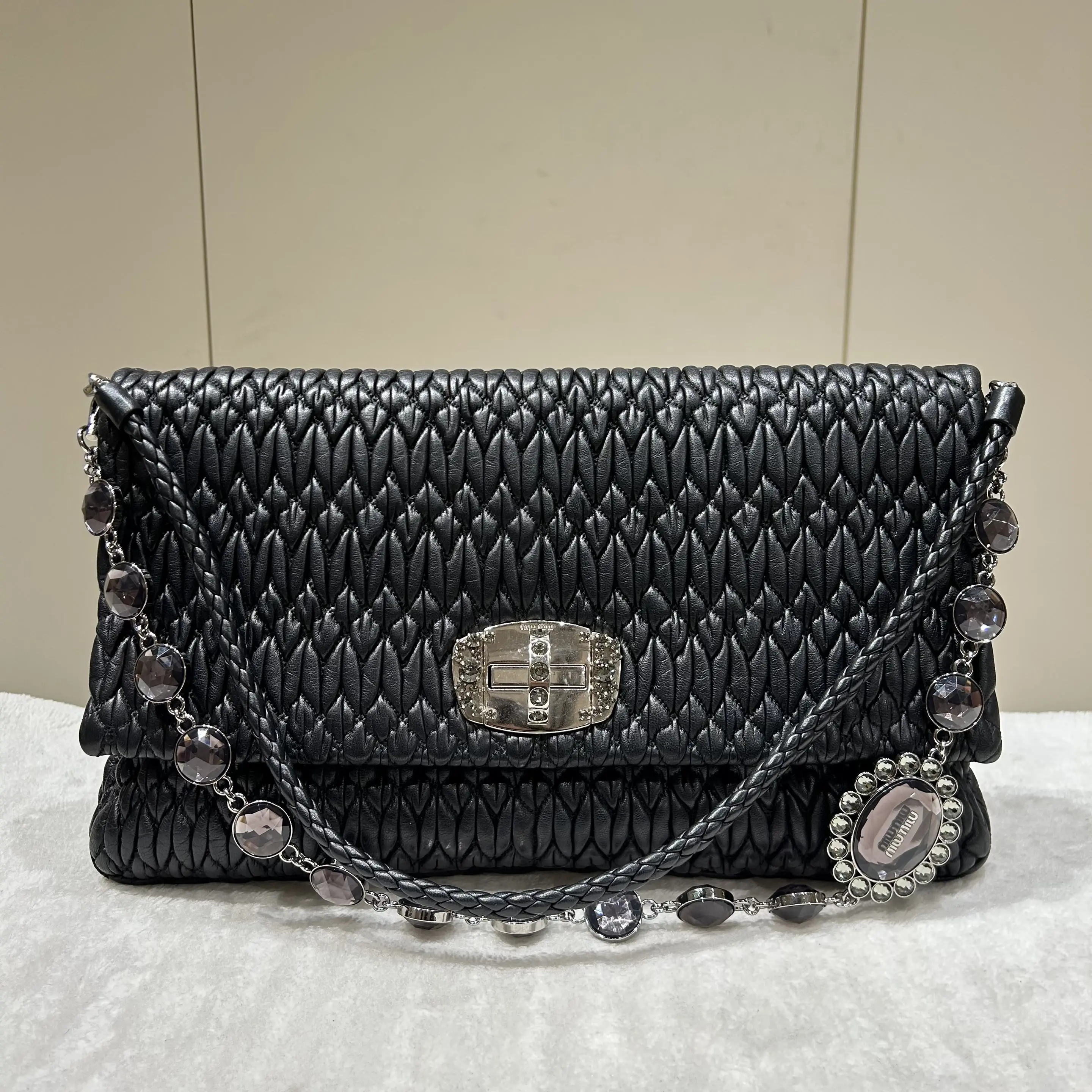 Pre-owned miu miu Leather Shoulder Bags Crystal Large Cloqué Lambskin Shoulder Bag in Black with Matching Tone Crystal Strap 42350833