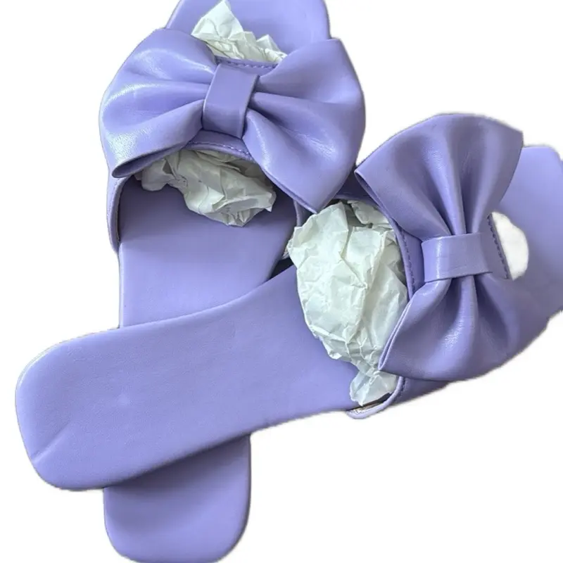 Trendy Open-Toe Slip-On Sandals with Oversized Bow Detail Soft Lavender Color for Spring Summer Looks
