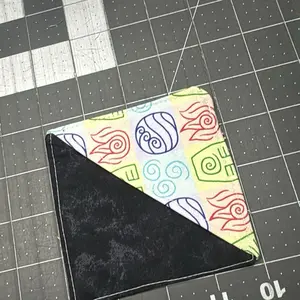 Fabric Bookmark with Colorful Swirl Design on Black Background