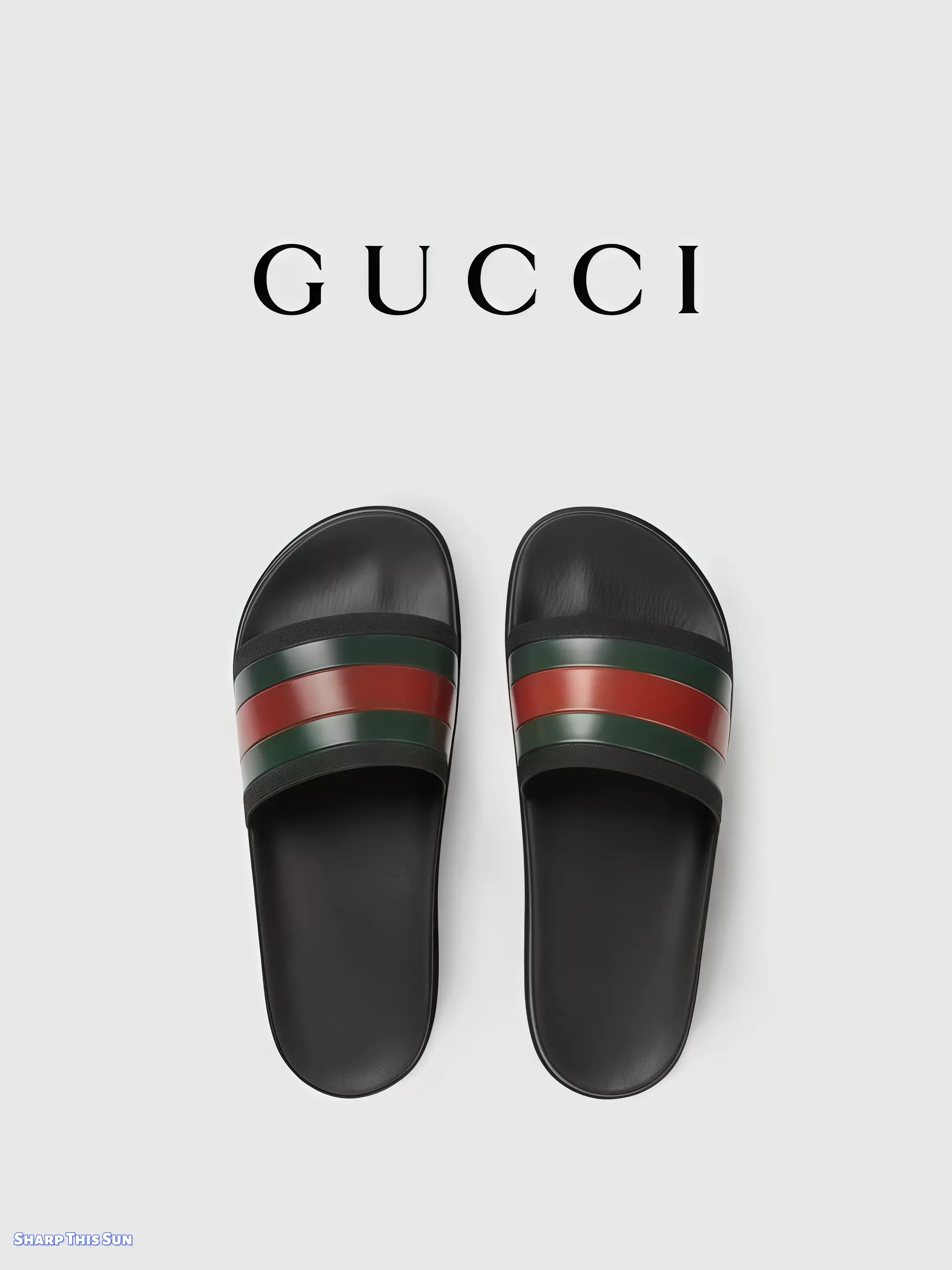 Black slide sandals with red green striped strap, smooth lightweight rubber material, flat cushioned footbed, for beach use, daily casual wearing