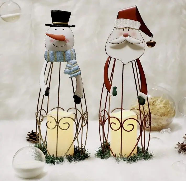 Illuminate your holiday decor with 2 Metal Santa Claus Lanterns! Perfect for Christmas, these LED lights will add a festive touch to your home.
