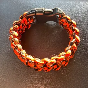 Orange and Black Type Paracord Bracelet with Durable Buckle and Braided Design for Outdoor Enthusiasts